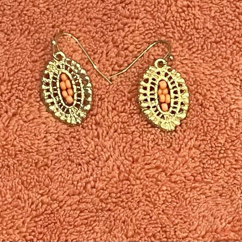 Small gold earrings with coral beads with long strand matching necklace